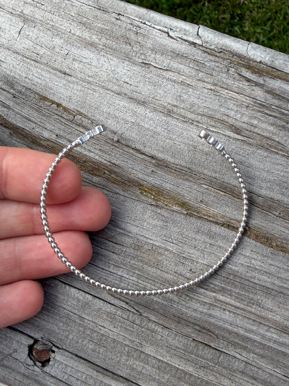 U-6768 Sterling Silver Graduating Bezel Set CZ Bangle 6 CZ Stones 0