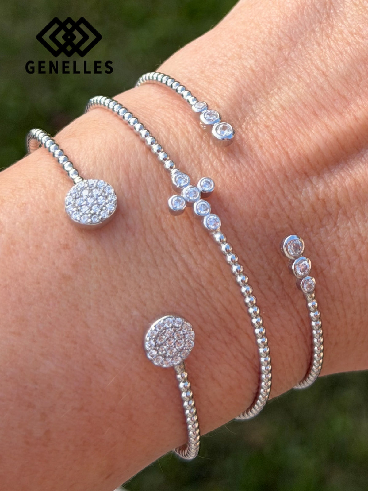 U-6768 Sterling Silver Graduating Bezel Set CZ Bangle 6 CZ Stones 0