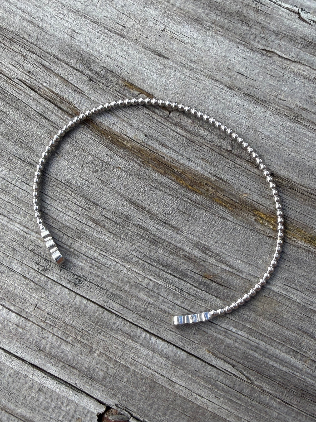 U-6768 Sterling Silver Graduating Bezel Set CZ Bangle 6 CZ Stones 0